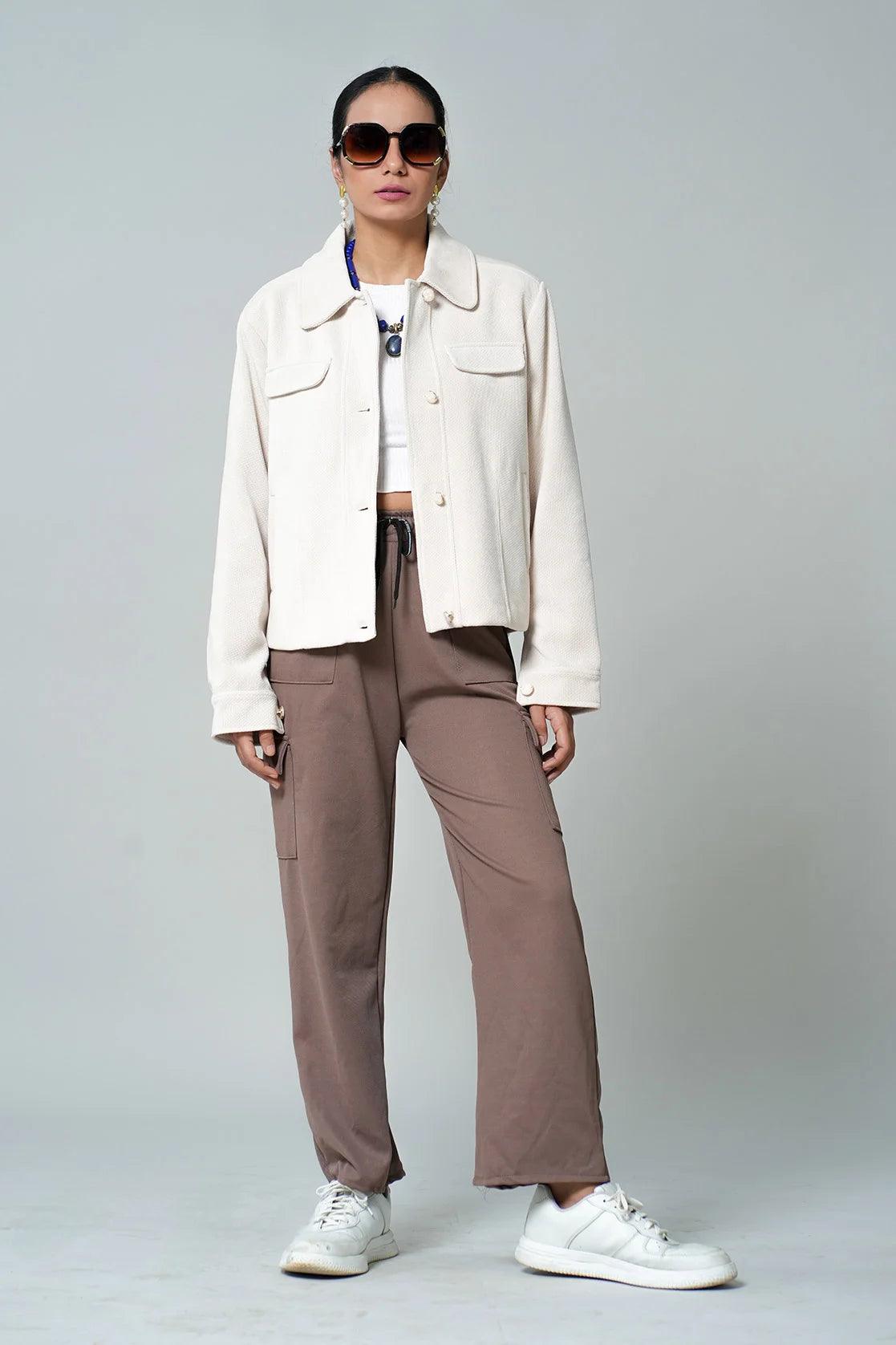 Discover the perfect upgrade to your wardrobe with the Women's Off White Knitted Jacket from Fort Collins. Featuring a button-down front closure, this trendy piece is available to shop online in India.