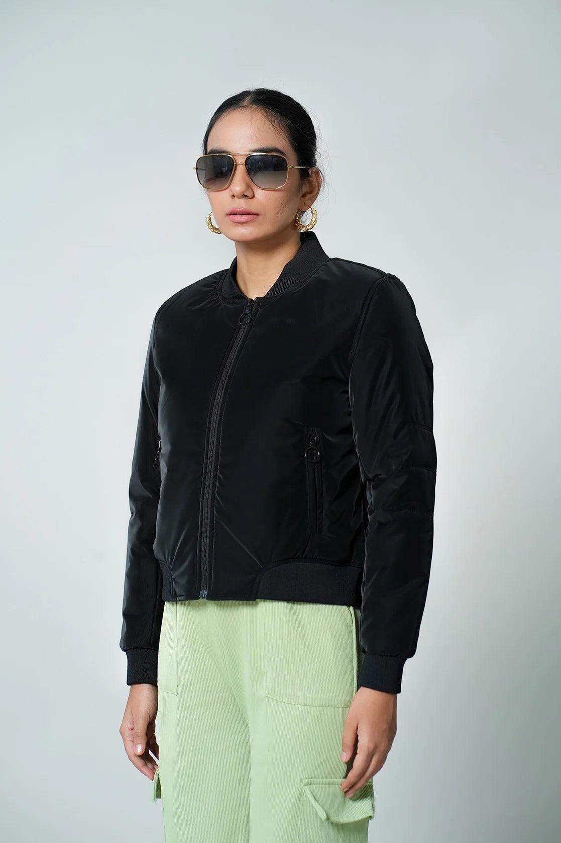 Upgrade your wardrobe with the Fort Collins Women's Black Crop Length Varsity Collar Puffer Jacket, available for online purchase in India. Expertly crafted for a fashionable look, this jacket will elevate your style.