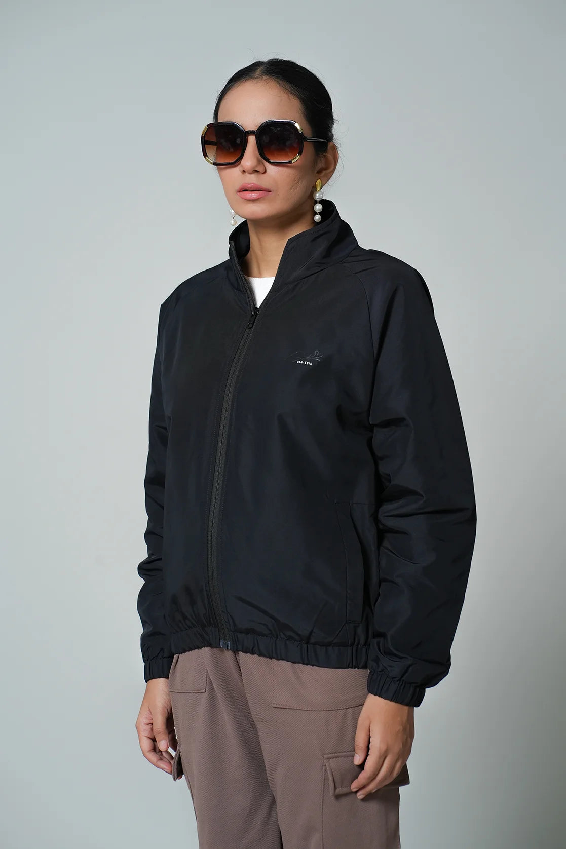 Elevate your wardrobe with Fort Collins' Womens Black Windbreaker Jacket featuring a mesh-net lining. Shop online for this stylish upgrade from anywhere in India.