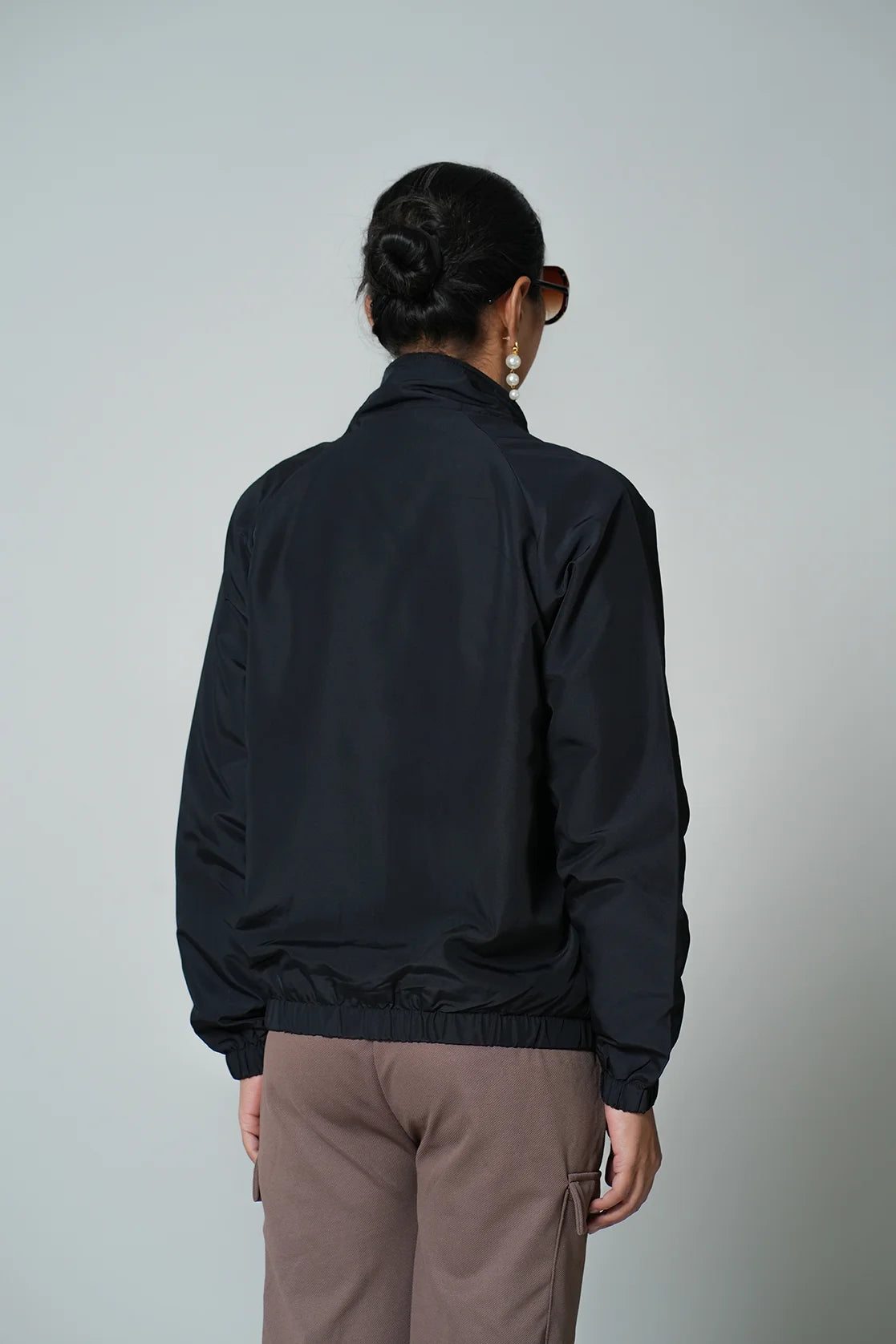 Upgrade your wardrobe with the Fort Collins Women's Black Windbreaker Jacket with Mesh-Net Lining. This stylish jacket is available for online purchase from anywhere in India.