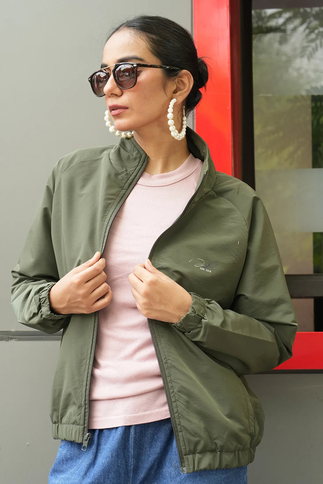 Elevate your wardrobe with the Women's Green Windbreaker Jacket by Fort Collins. Featuring a mesh-net lining, this trendy jacket is the perfect addition to your collection. Shop now and upgrade your style sensibilities from anywhere in India.