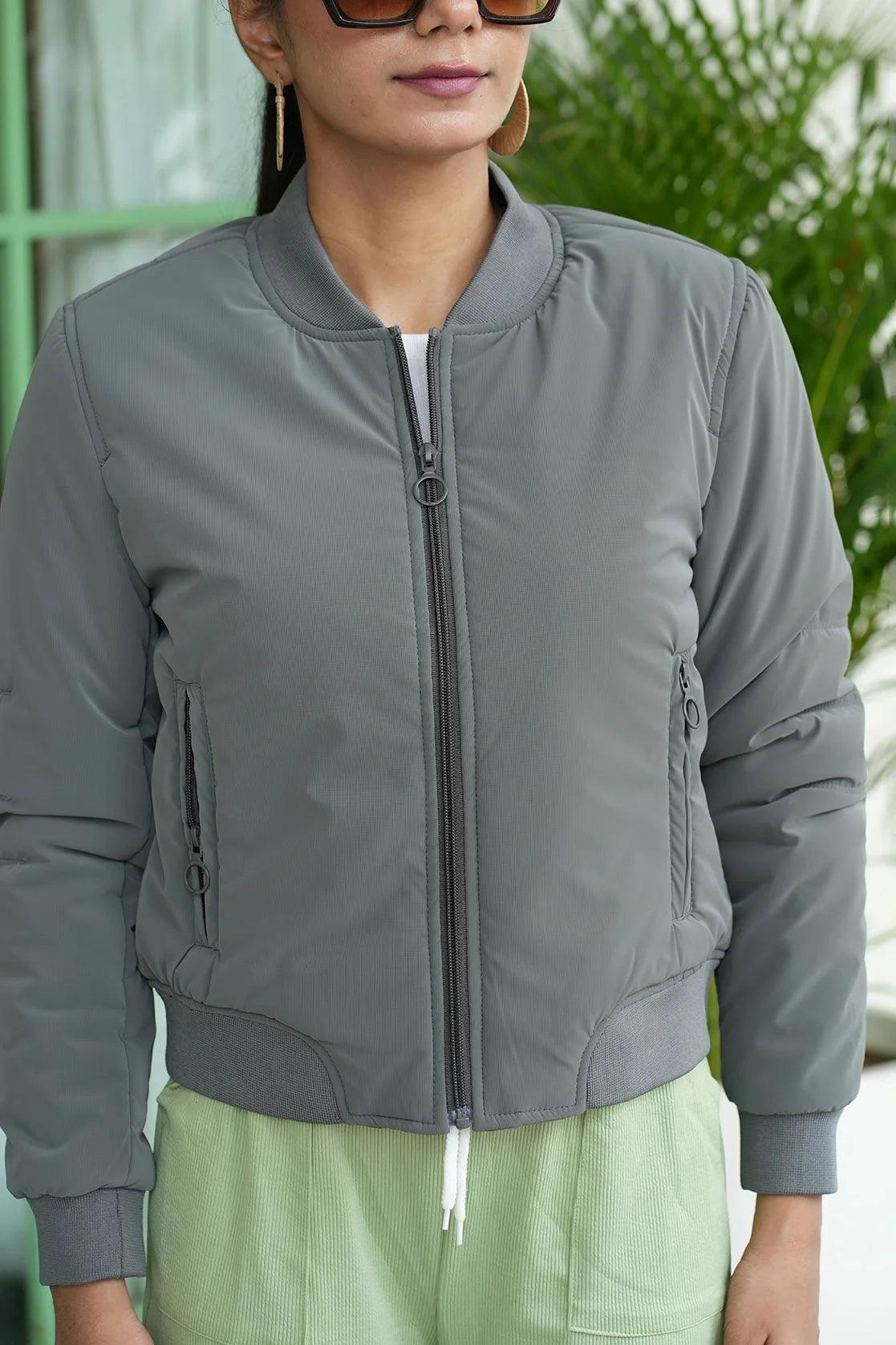 This Women's Grey Crop Length Varsity Style Poly Fill Jacket, available for online purchase in India, is brought to you by Fort Collins. Explore the convenience of shopping from anywhere in India with this stylish jacket.