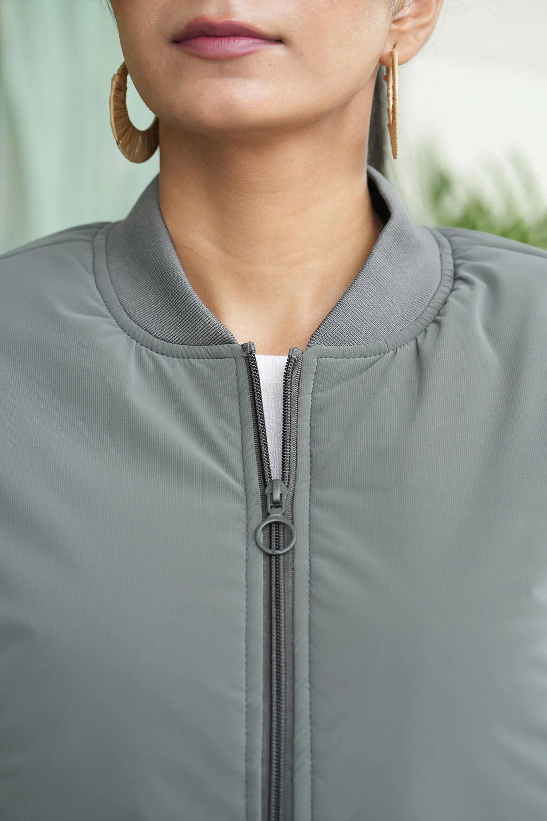 Shop the Women's Grey Crop Length Varsity Style Poly Fill Jacket from Fort Collins, now available for online purchase in India.