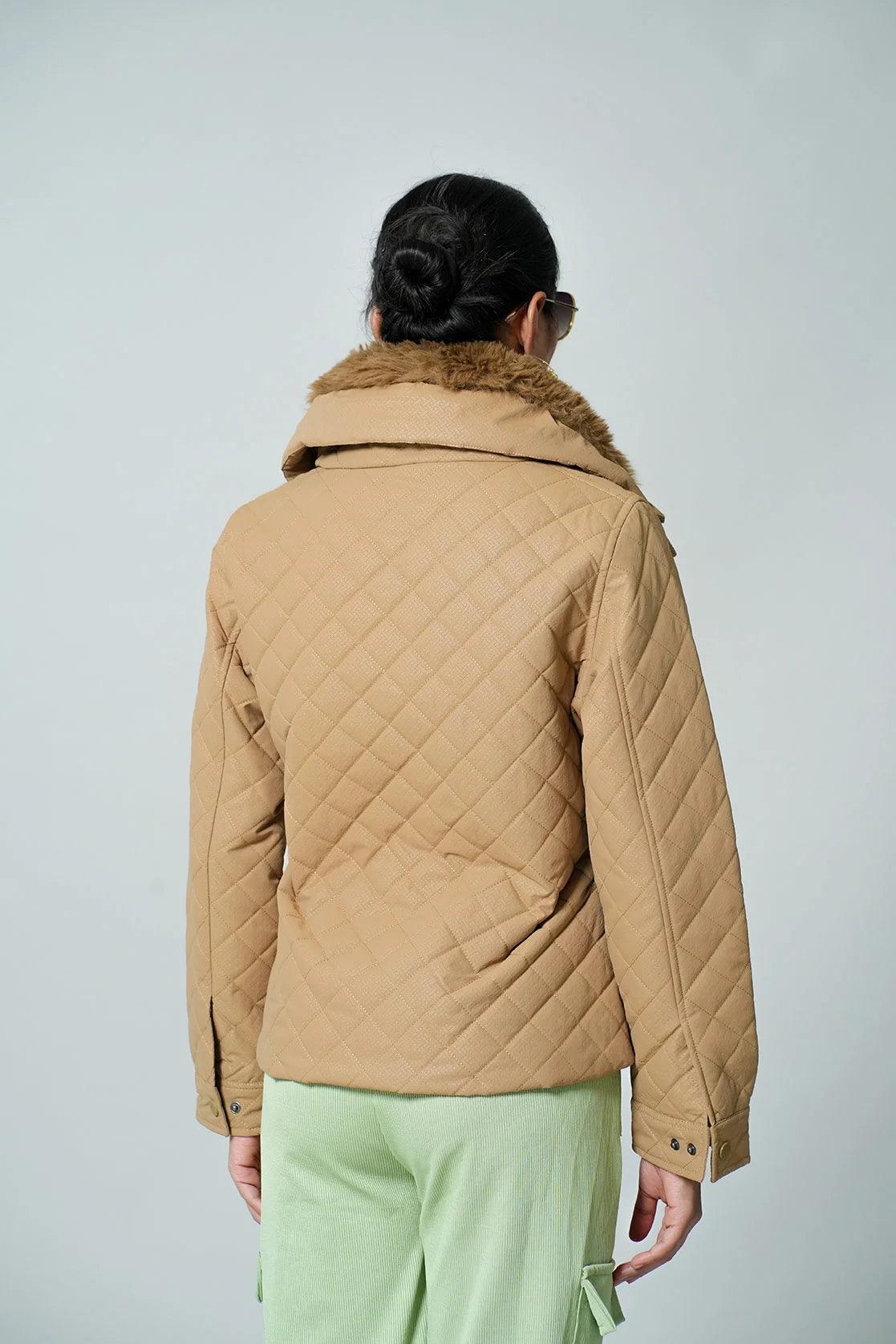 Upgrade your wardrobe with the Fort Collins Women's Beige Quilted Jacket, featuring a fur-lined mock collar. Shop now online from anywhere in India for a stylish addition to your look.