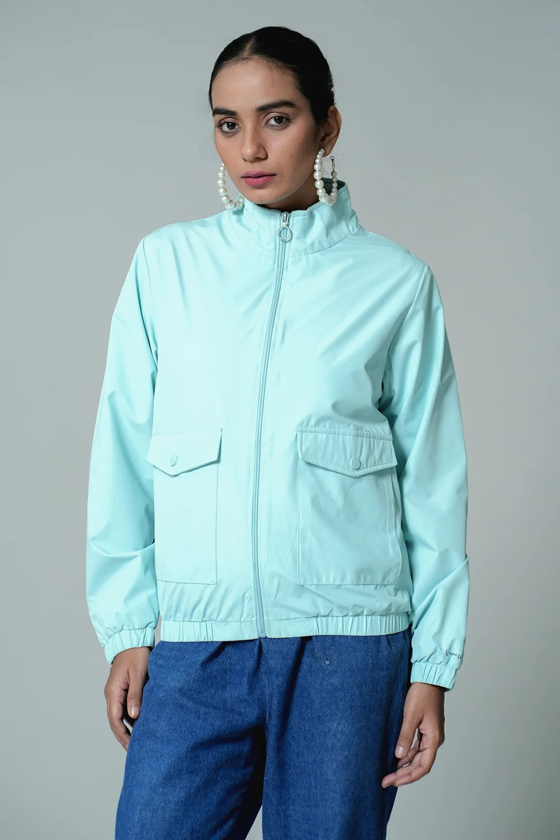 Shop now for a stylish wardrobe upgrade from anywhere in India with the Women's Sky Blue Windbreaker Jacket by Fort Collins, featuring a mesh-net lining.