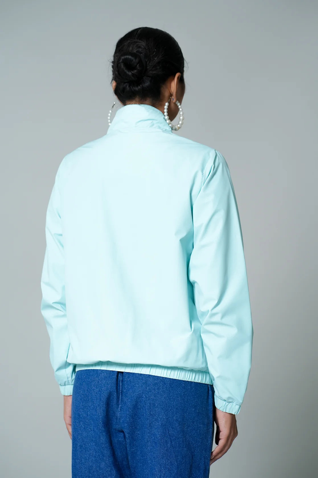 Upgrade your wardrobe with the trendy Women's Sky Blue Windbreaker Jacket with Mesh-Net Lining from Fort Collins. Shop online now for stylish fashion options, available all over India.