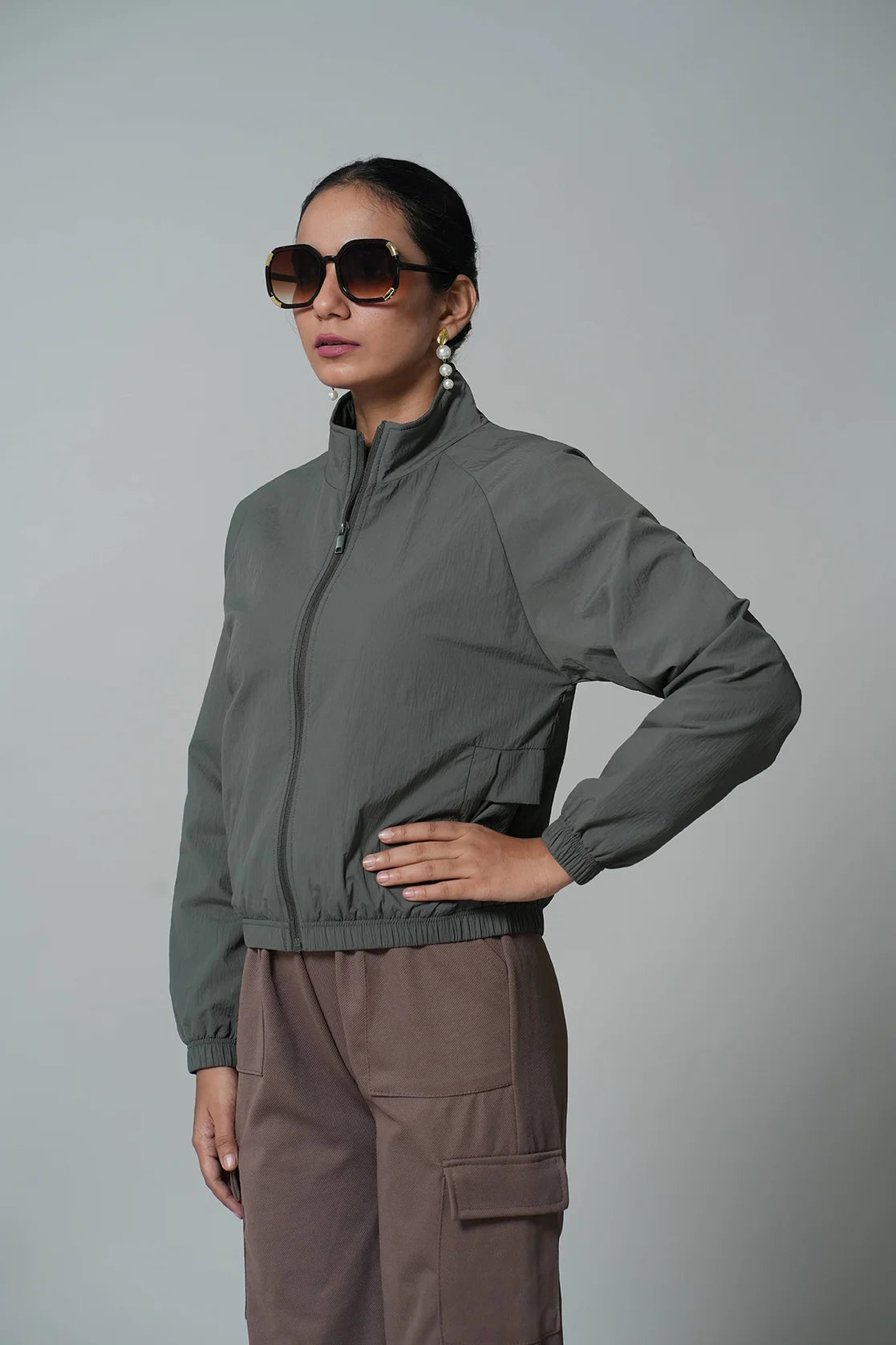 Shop the latest wardrobe must-have from Fort Collins: the Women's Olive Lightweight Crop-Length Jacket with Stand Collar. Order online now for a stylish upgrade to your collection, available anywhere in India.