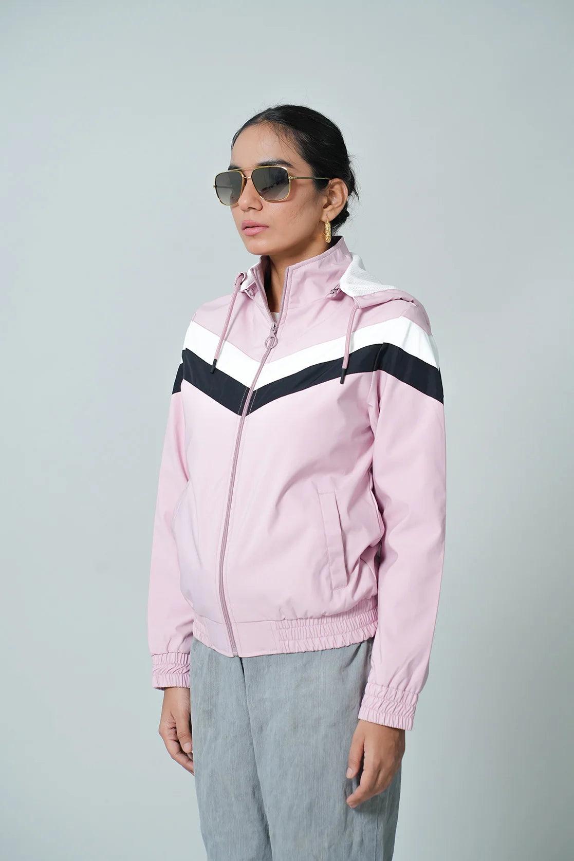 The Women's Pink Lightweight Chevron Windbreaker Jacket with Adjustable Hood by Fort Collins is now available for purchase online in India.