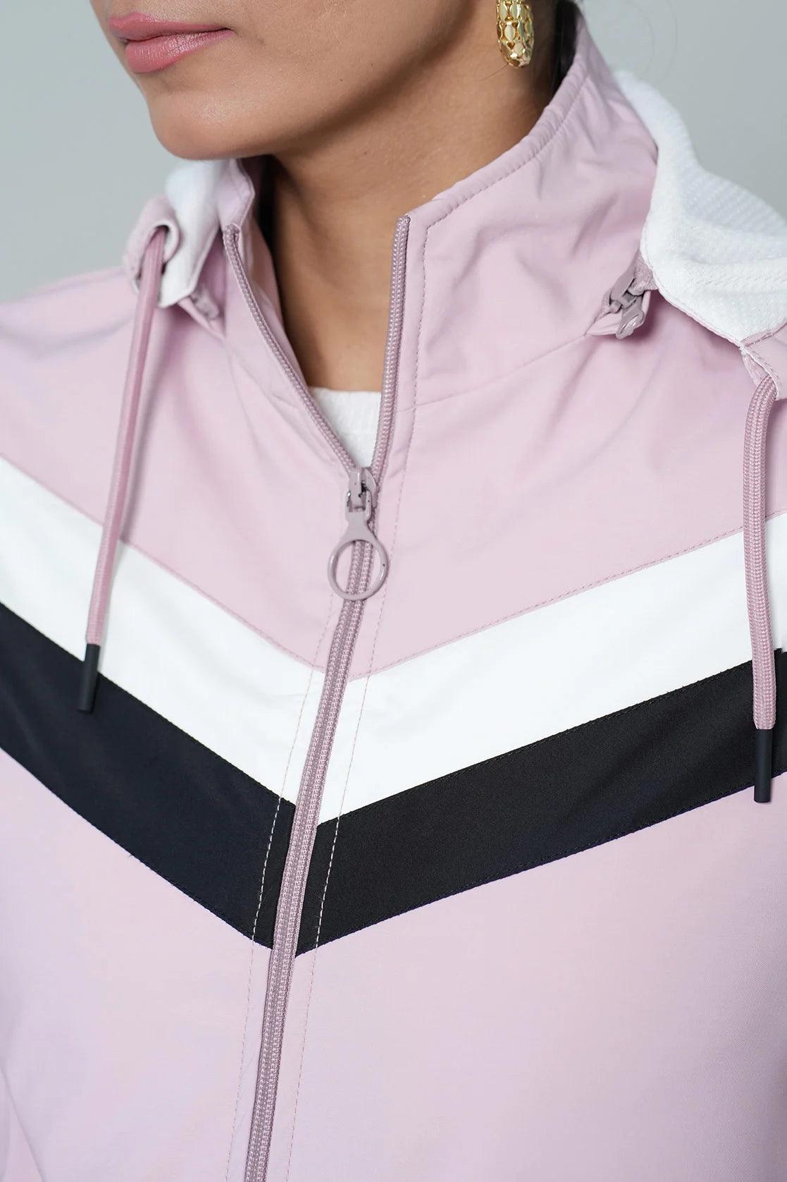 Expertly designed for versatility and functionality, the Women's Pink Lightweight Chevron Windbreaker Jacket features an adjustable hood and is now available for online purchase in India.