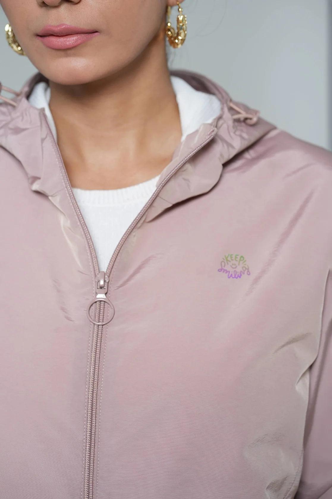 Order the Women's Pink Lightweight Windbreaker Jacket with Adjustable Hood online in India from Fort Collins.