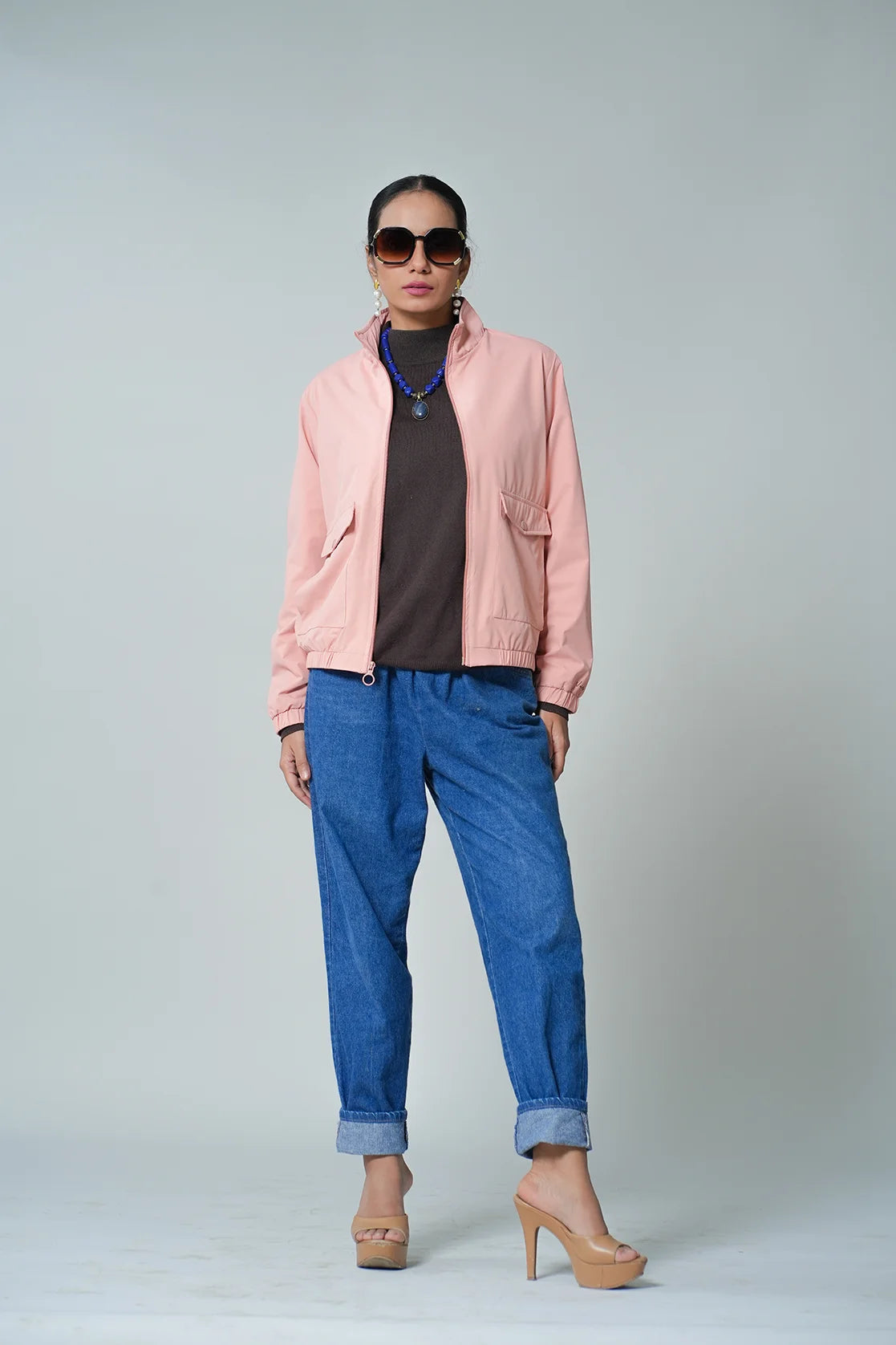 Purchase the stylish Women's Pink Windbreaker Jacket with Mesh-Net Lining online today to elevate your wardrobe. Available in India and perfect for any fashion-forward individual.