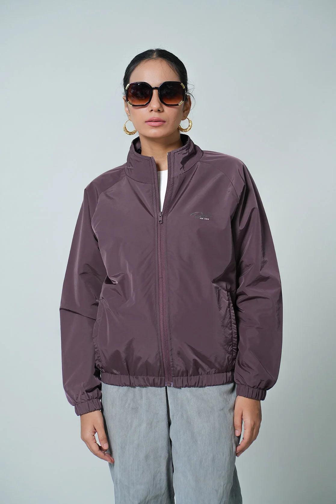 Elevate your wardrobe with this Women's Purple Windbreaker Jacket from Fort Collins. Experience the ultimate in style and comfort with its mesh-net lining. Shop online from anywhere in India now.