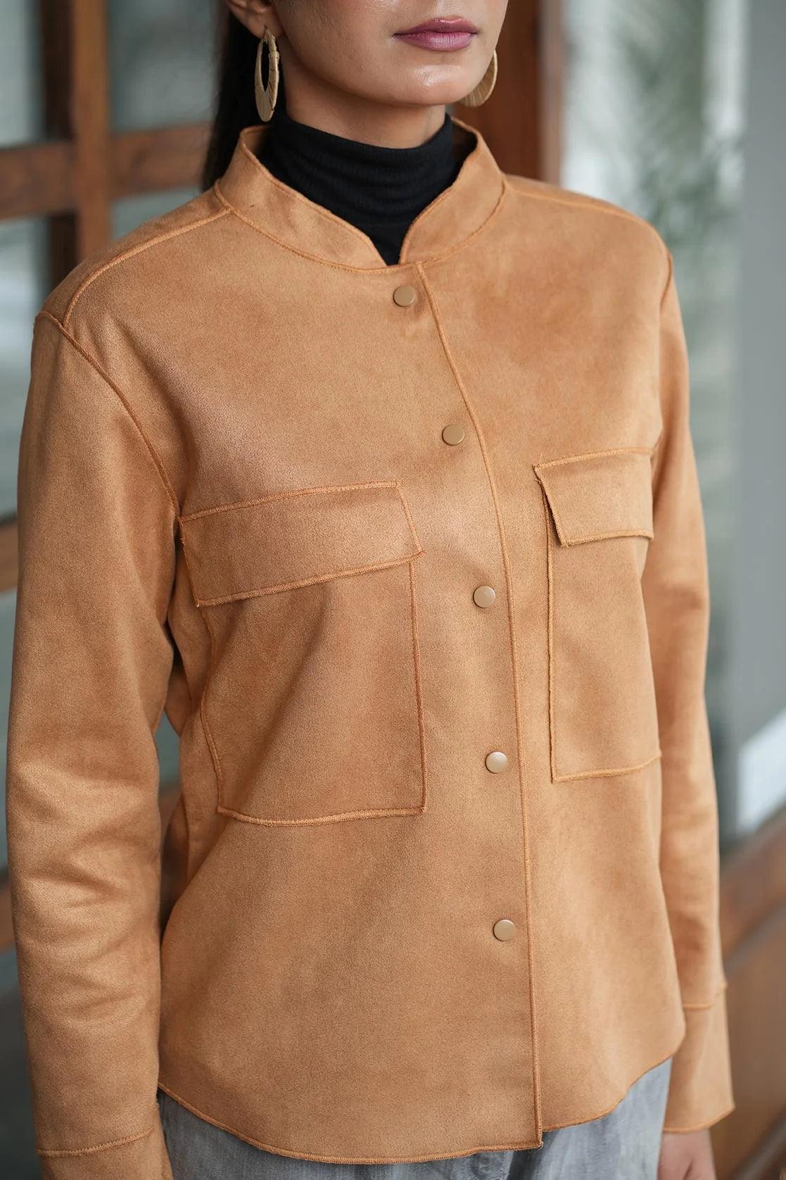 Upgrade your wardrobe with the Fort Collins Women's Tan Suede Shacket, featuring dual chest pockets. Shop now for this trendy piece online from anywhere in India.