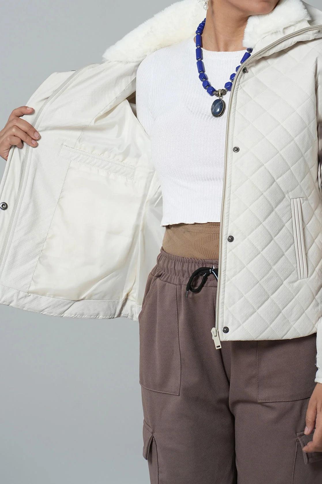 This women's jacket, the Fort Collins White Quilted Jacket with Fur-Lined Mock Collar, is now available for online sale in India.