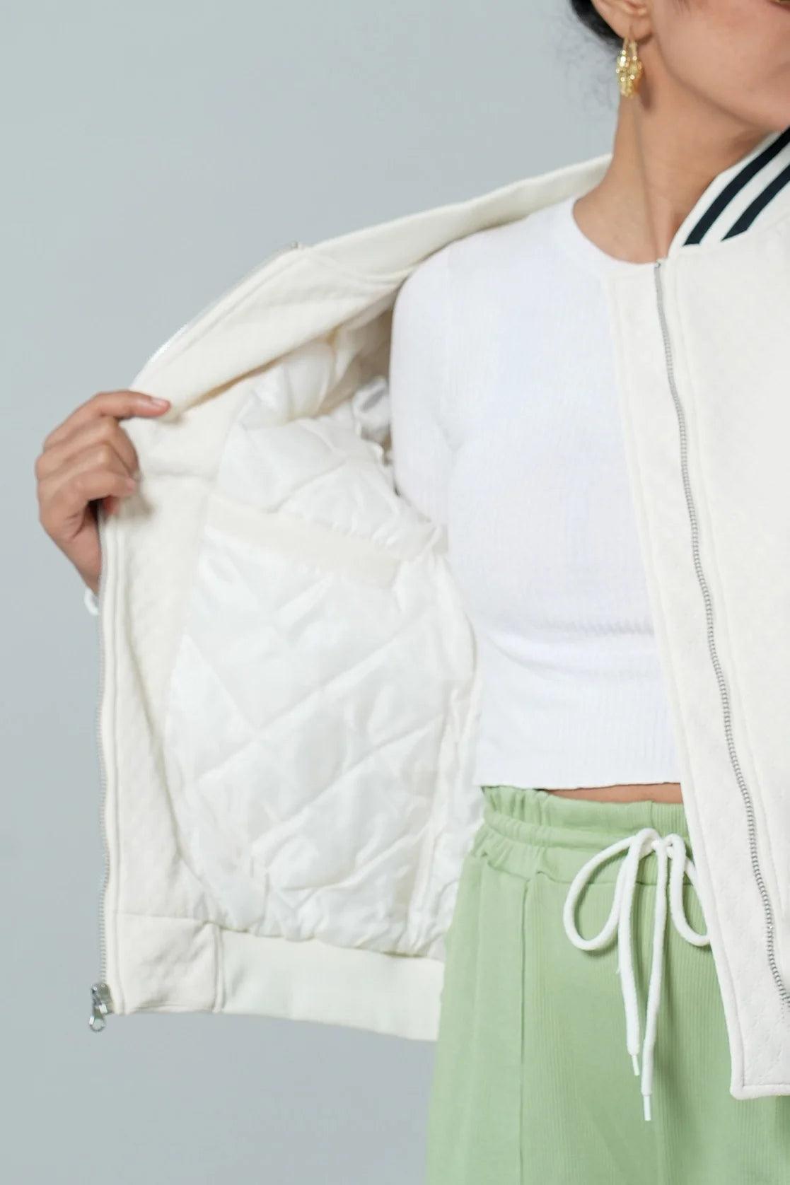 Upgrade your wardrobe with the Fort Collins Women's White Quilted Pattern Varsity Collar Jacket, available online from anywhere in India. Experience a trendy and fashionable look with this stylish jacket.