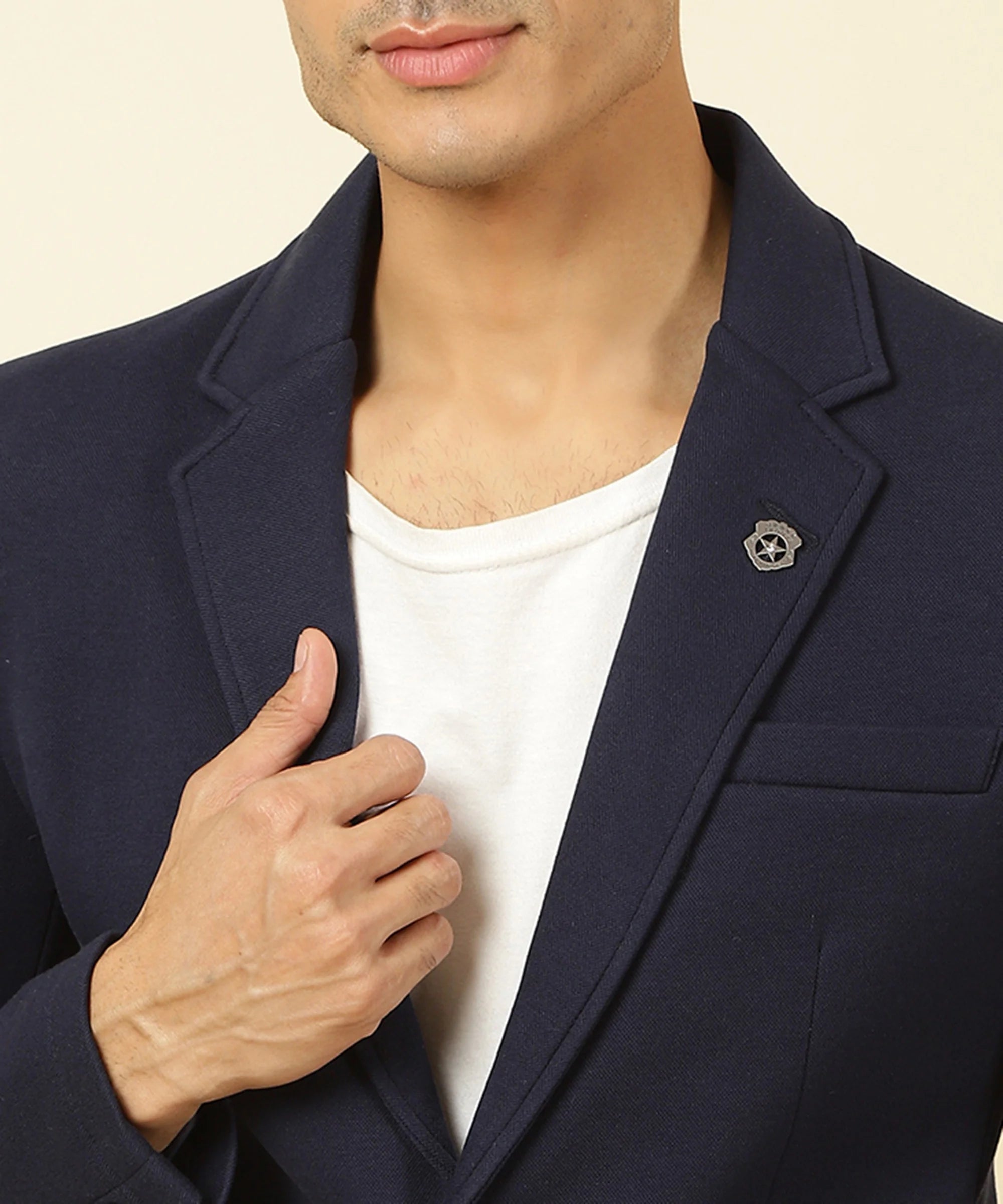 Find a stylish wardrobe upgrade with the Fort Collins Men's Navy Cotton Blend Knitted Blazer featuring a Notched Lapel. Available online and perfect for any location in India.