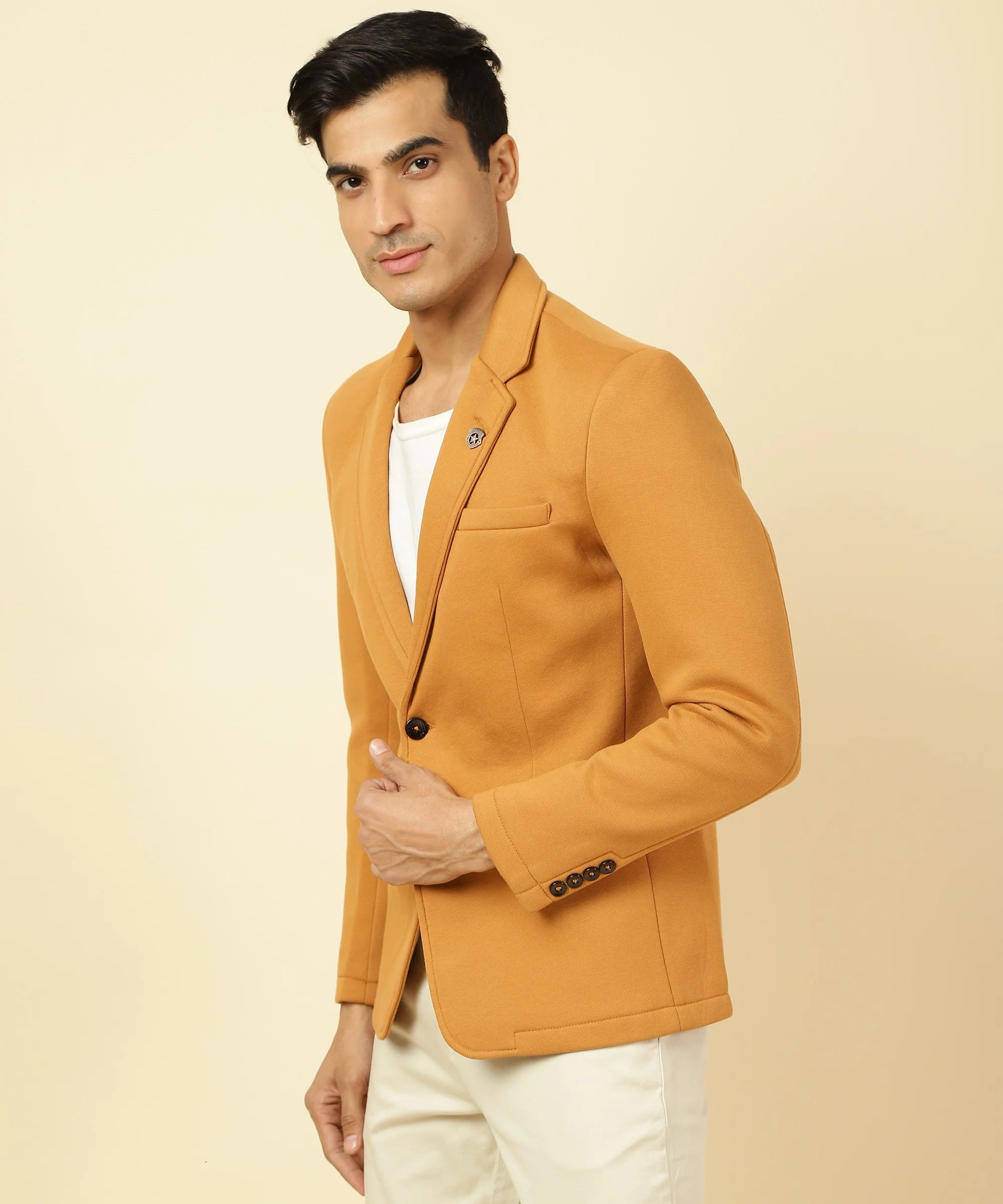 Upgrade your wardrobe with the stylish Men's Mustard Knitted Blazer by Fort Collins. Shop now online from anywhere in India.