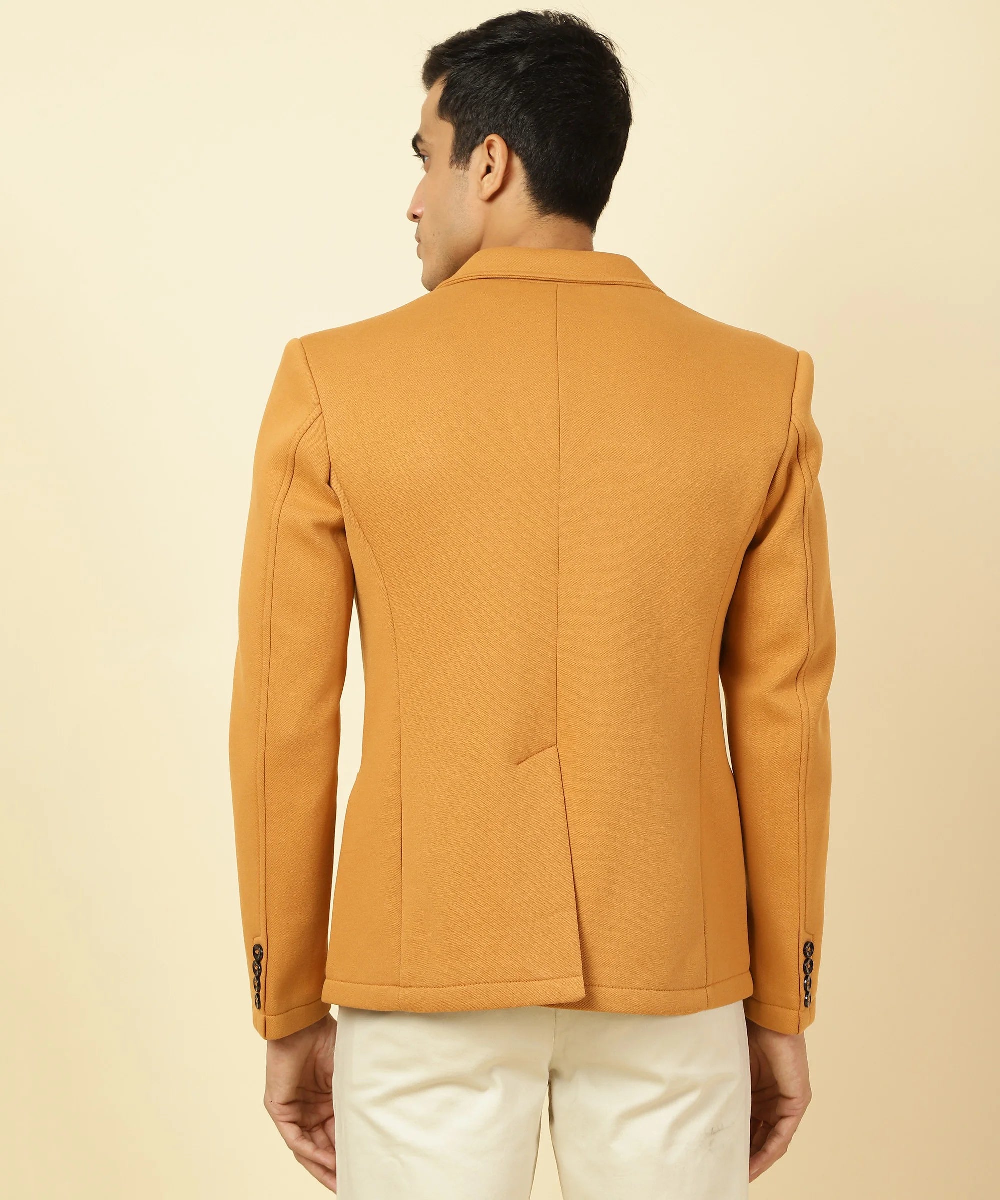 Shop now for a stylish Men's Mustard Knitted Blazer with Notched Lapel by Fort Collins, available online and shipped to anywhere in India. Upgrade your wardrobe with this trendy piece.