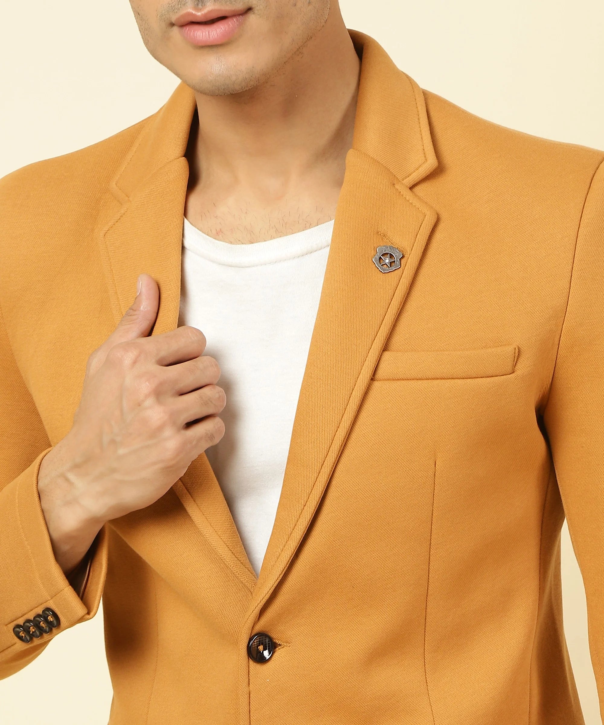 Shop now online for a stylish wardrobe from anywhere in India with the Fort Collins Men's Mustard Knitted Blazer featuring a Notched Lapel.