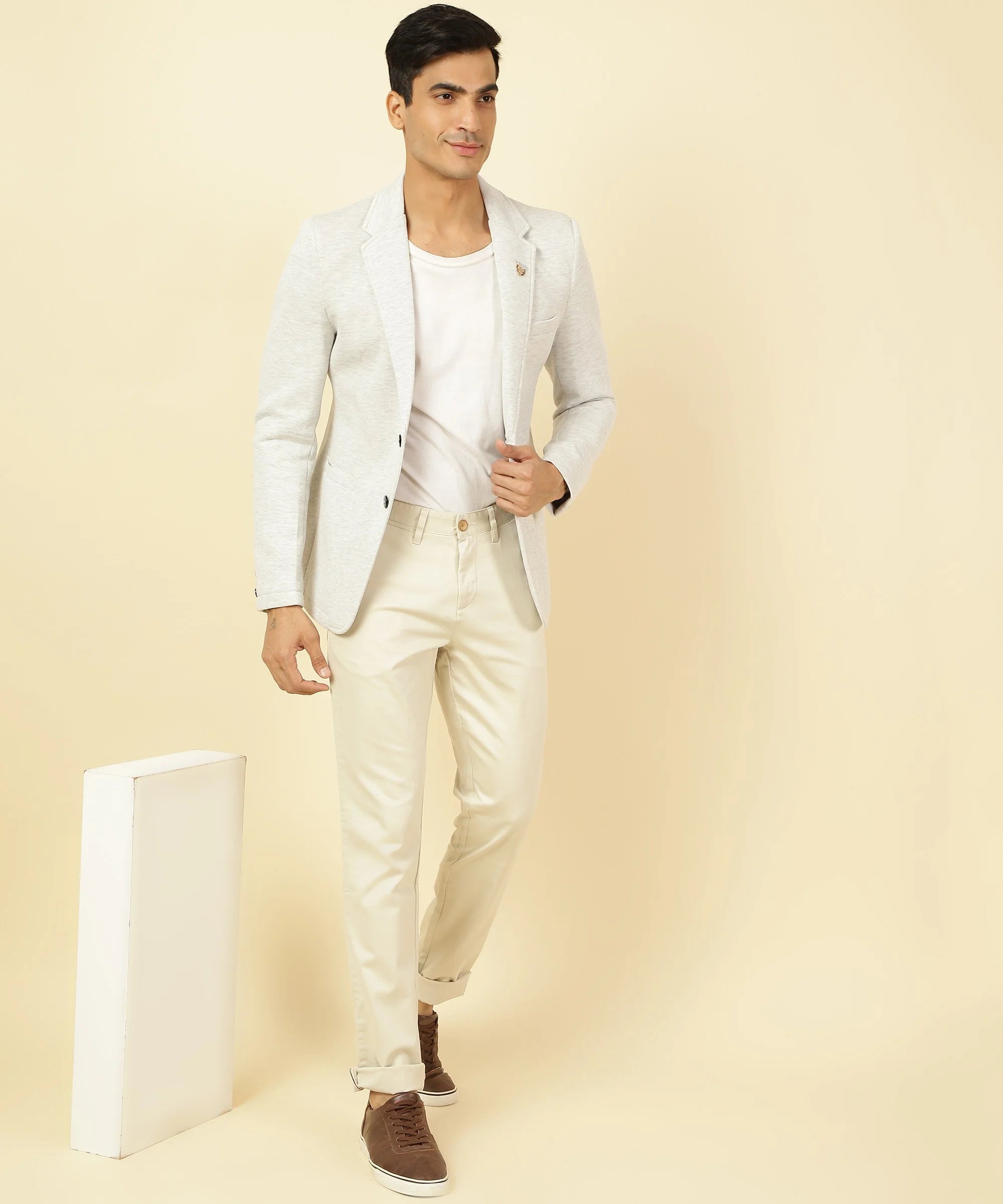 Discover a sophisticated addition to your wardrobe with the Men's Off White Knitted Blazer from Fort Collins. Available for online purchase throughout India.