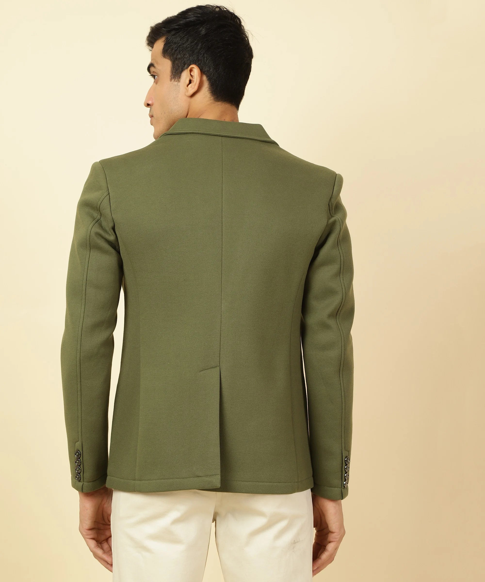 Upgrade your wardrobe with the Fort Collins Men's Olive Green Knitted Blazer. This stylish piece features a notched lapel and can be conveniently purchased online from anywhere in India.