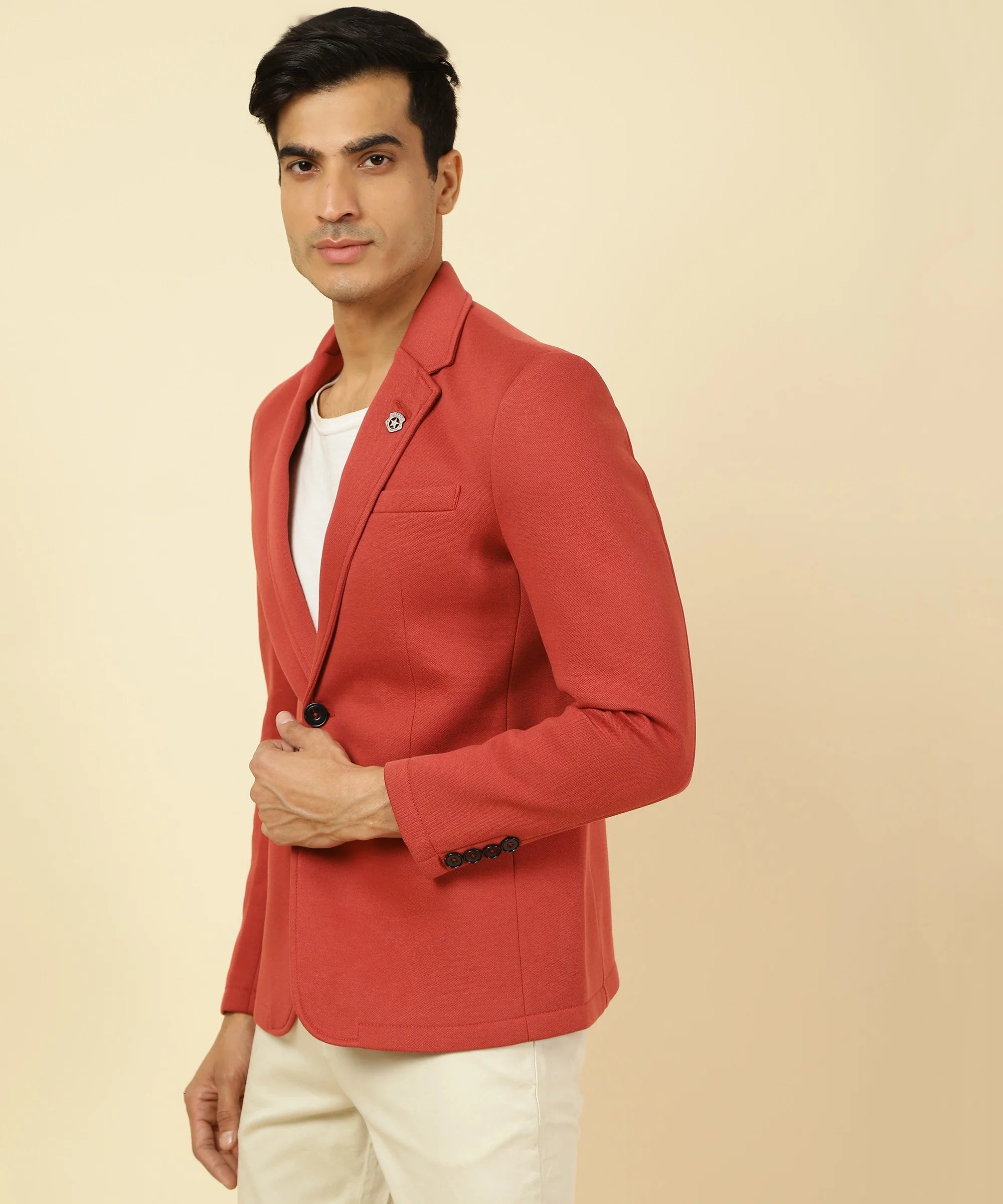 Experience a stylish upgrade to your wardrobe with the Fort Collins Men's Orange Knitted Blazer, crafted from a comfortable cotton blend. Shop now online for a versatile and trendy addition to your closet, available for purchase from anywhere in India.