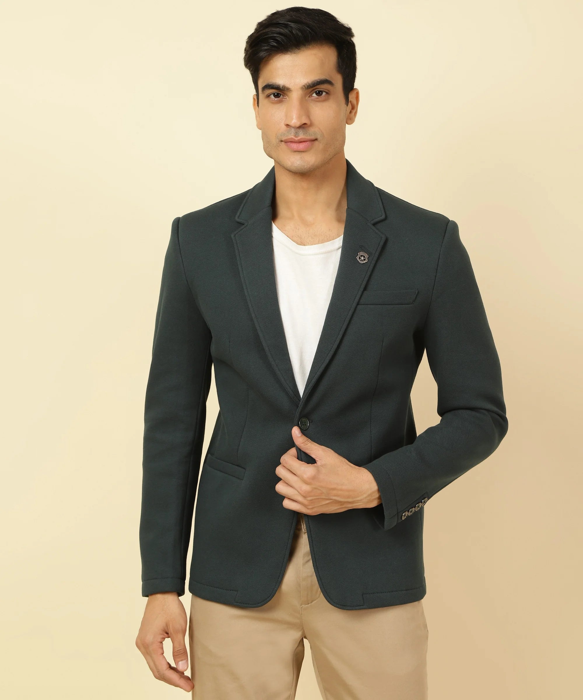 Upgrade your wardrobe with the Men's Shadow Green Knitted Blazer, featuring a notched lapel, by Fort Collins. Available for online purchase throughout India.