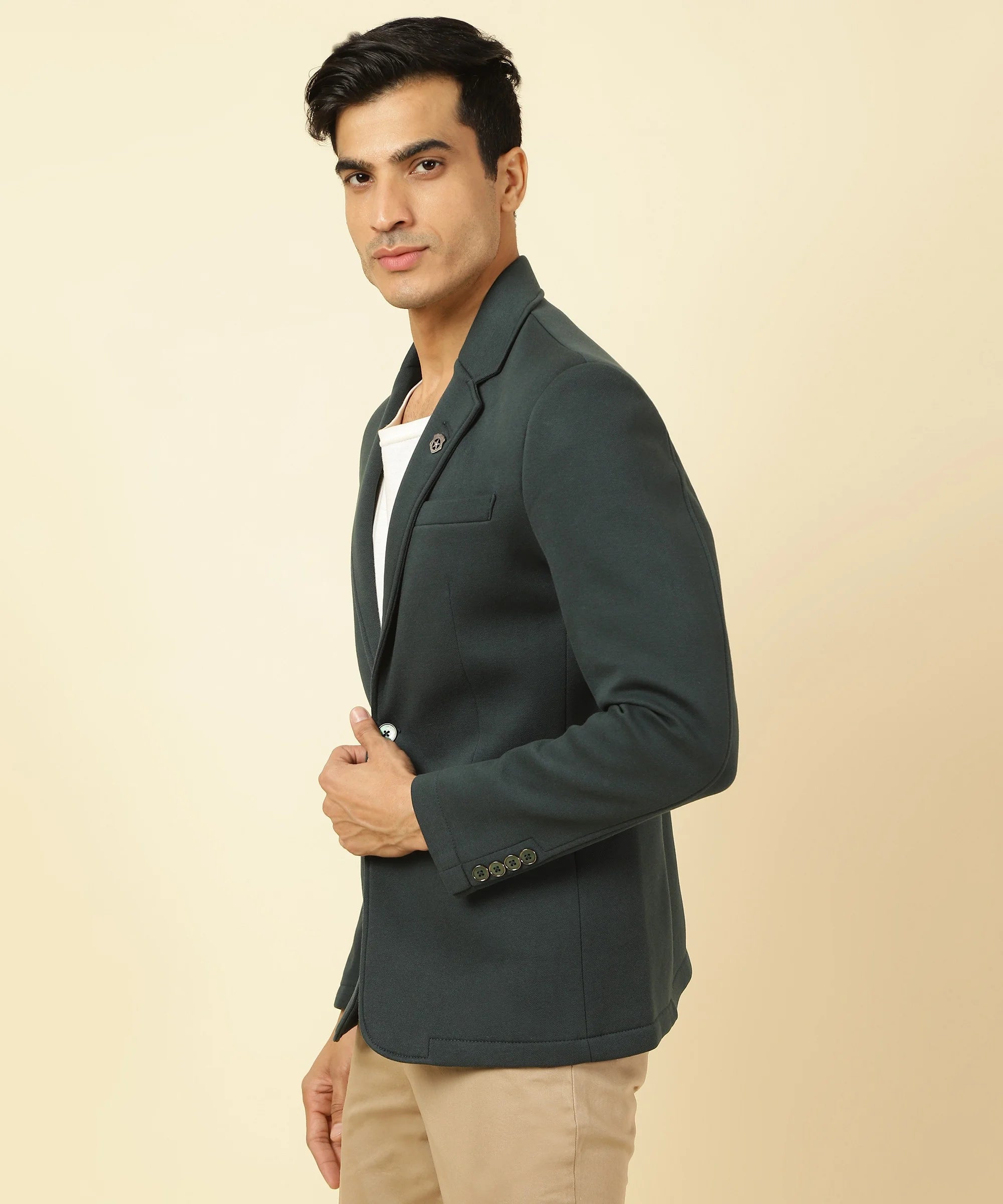 Discover the on-trend Men's Shadow Green Knitted Blazer with Notched Lapel by Fort Collins, available for purchase online from anywhere in India. Expand your wardrobe with this stylish piece today!