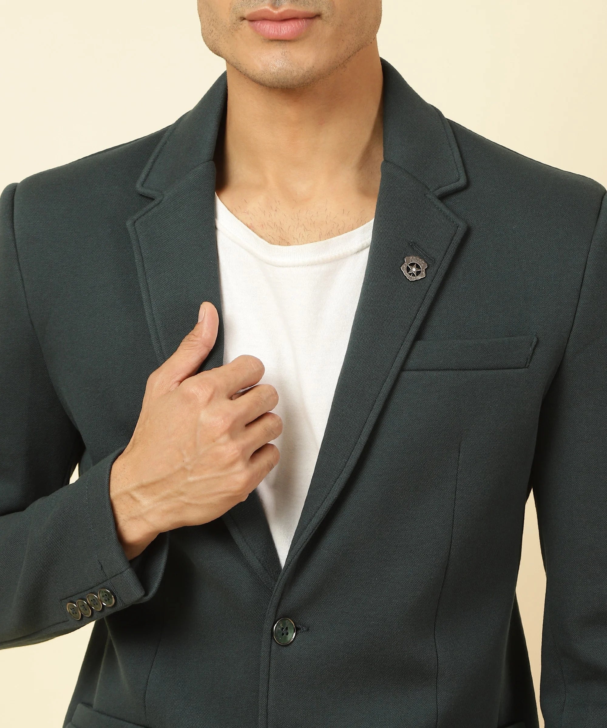 Shop for a fashionable wardrobe with the Men's Shadow Green Knitted Blazer with Notched Lapel from Fort Collins. Available for online purchase, update your style from anywhere in India.