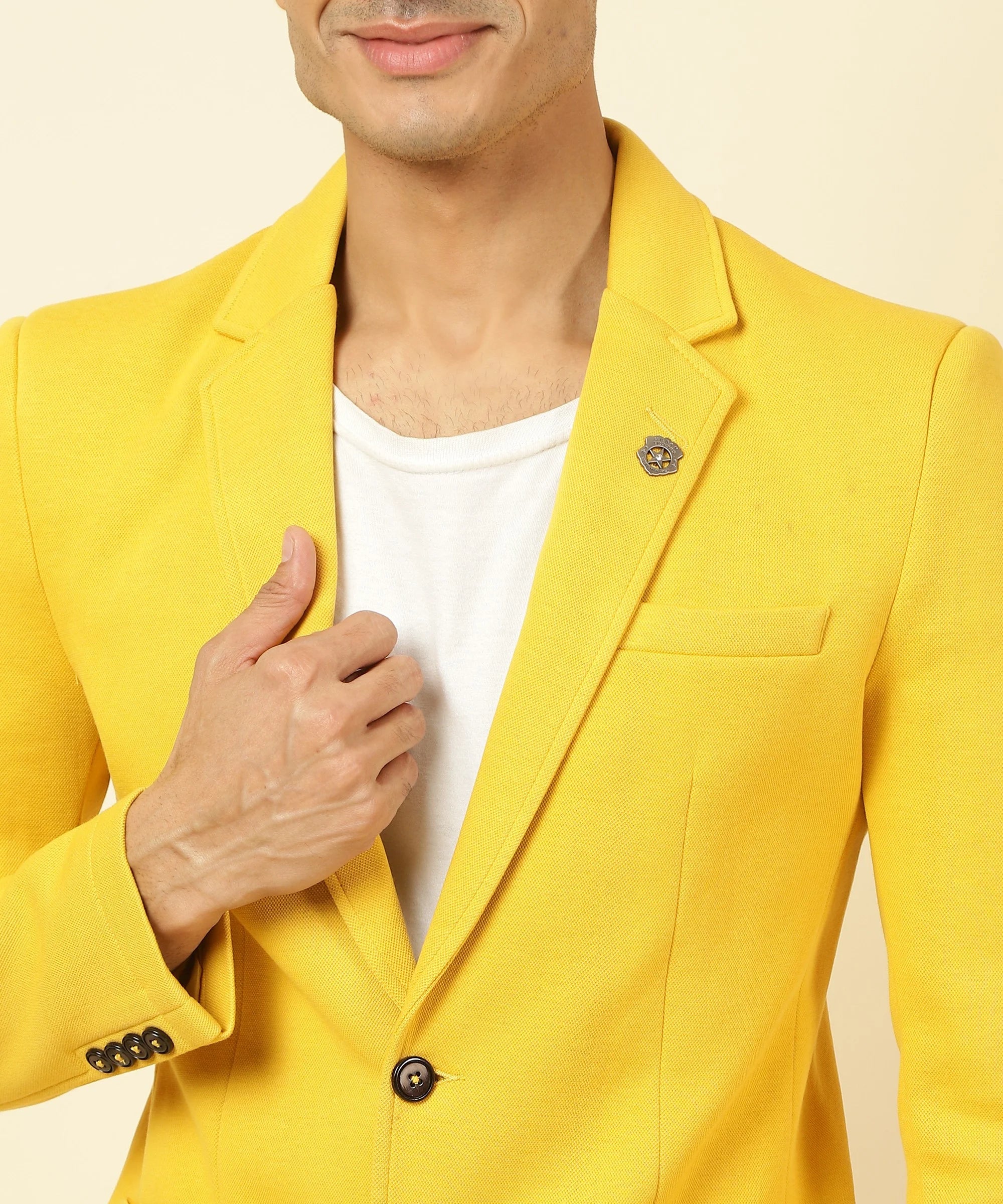 Upgrade your wardrobe with our Men's Yellow Knitted Blazer, made with a comfortable and durable cotton blend. Shop now online from anywhere in India for a trendy and versatile addition to your closet.